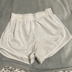 White Nike shorts